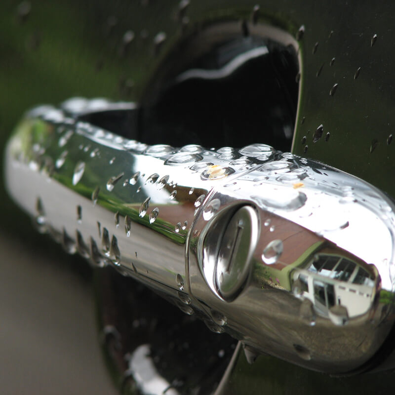 Car door handle in the rain